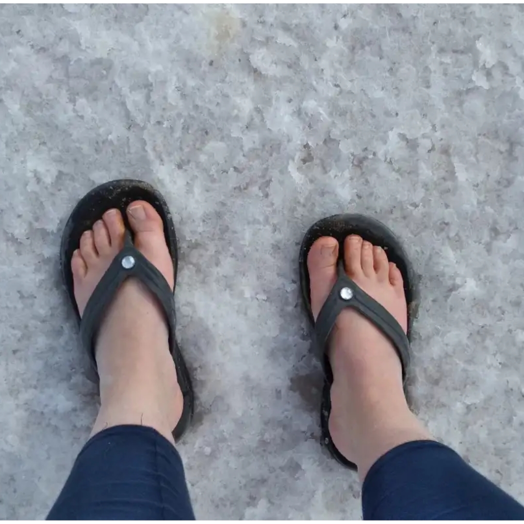 Image of feet on salty landscape